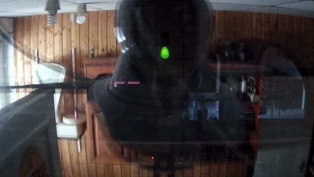 A reflection of a webcam in a customer's home, captured on IP Crawl.